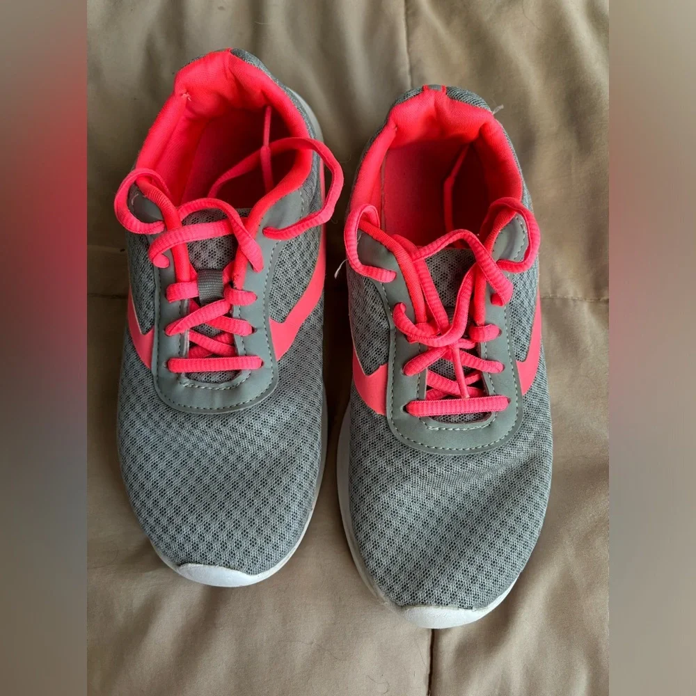 Athletic Works. Tennis shoes. Still have some play time in them. Size 3